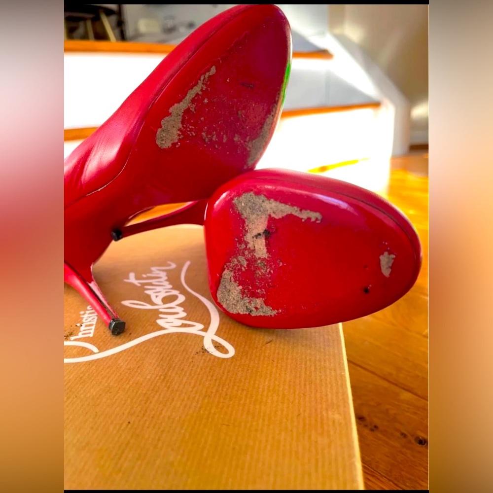 Selling Christian Louboutin.. size 7 in Red. Wore only twice in good condition